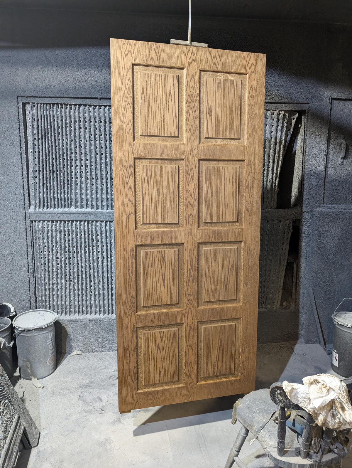The Ashbourne bespoke stained oak veneer eight panel internal door with raised mouldings 1 